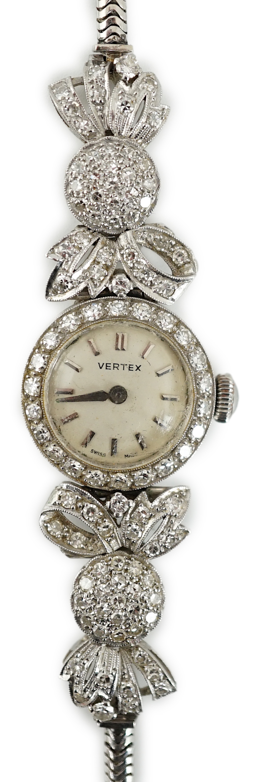 A lady's mid 20th century platinum and round cut diamond set Vertex manual wind cocktail watch